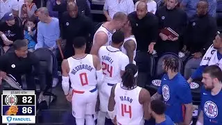 MASON PLUMLEE AND BONES HYLAND FIGHT ON CLIPPERS BENCH DURING A TIMEOUT