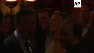 Macron celebrates 1st round victory with friends