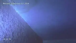 03250