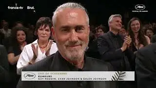 Roy Dupuis smiles at the Cannes Festival 'Rumors' premiere