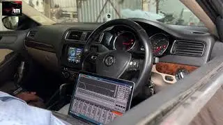 2-way active audio setup with head unit in a Volkswagen Jetta, including sound damping for all doors