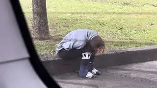 Crisis in Kensington Philadelphia Woman Addict Passes out on curb at the Park
