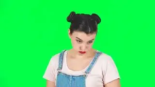 Young Woman Stands Waiting with Boredom on Green Screen  Slow Motion