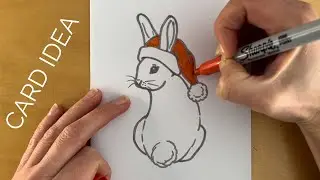 Draw an easy rabbit in a Santa hat