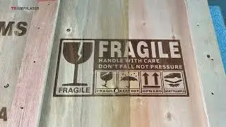 Laser engraving fragile labels on plywood box