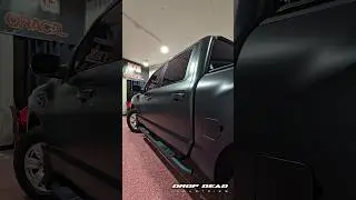 Nissan Titan Wrapped In Wrap Fresh ARMR satin Black at Drop Dead Industries