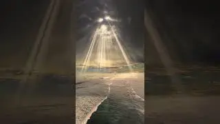 Rays Of Sun Peeking Through Clouds
