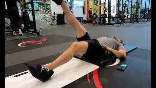 Single Leg Eccentric Only Hamstring Curl on Slide Board
