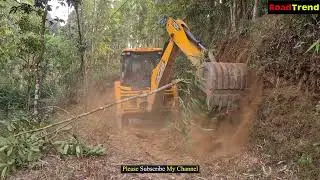 JCB cleaning and leveling hill road constriction- Jcb backhoe  cutting sloppy hill