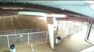 Caught on camera: Arkansas rodeo roof collapses under snow as Coast Guard makes icy water rescue