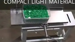 Compacting plastic parts in a container using the SMOOTH-MOVE&trade; Linear Compaction System.