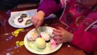 Baby sings her own Easter egg decorating song