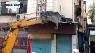 Thane civic body demolishes illegal shop extensions