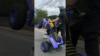 Third person view of Yamaha banshee wheeling