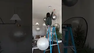 oversized floating ornaments for this years Christmas party say less