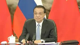 Premier Li, PM Mishustin vow support for multilateralism, stronger bilateral relations