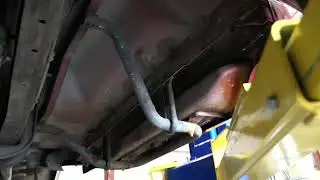 Underside walk through the low mile 1 owner 1994 Ford F150 Flareside 4x4 @bringatrailerauctions