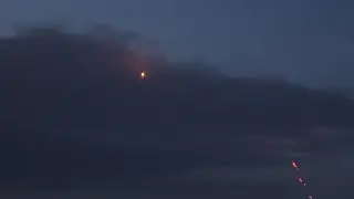 Air defence tracer fire lights up Kyiv sky