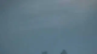 Three Black Orbs dancing and spinning around Each Other