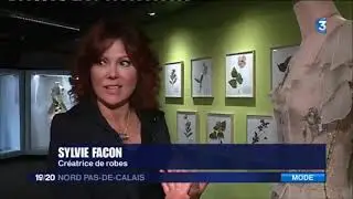 Caudry une exposition de robes en dentelle florale