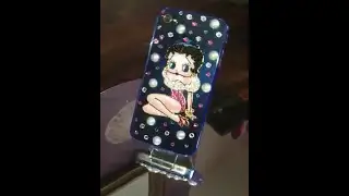 IPhone 4 case with Swarovski Crystals on tinted blue case cover. Betty Boop Design