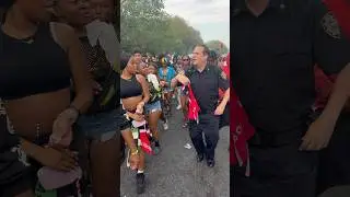 NYPD having time of their life at the West Indian parade