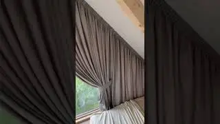 Серые шторы на треугольное окно