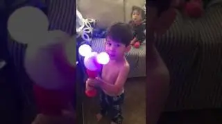 EJ excited over his Mickey bubble wand