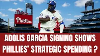 What does Adolis Garcia's contract mean for J.T. Realmuto?