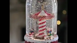 Animated Carousel With Moving Figurines Lighted Water Lantern (Snow Globe) Battery Operated