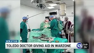 Toledo Doctor giving aid in war zone