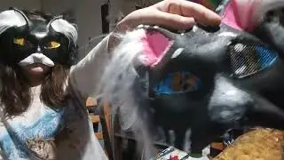 I paint an eye on my wolf mask