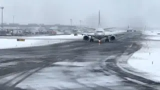 NY: Snowstorm Impacts Busy Holiday Travel Period