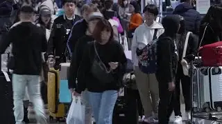 Taiwan travelers keep plans despite Chinese military drills | REUTERS