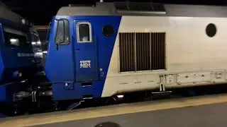 Diesel passenger train exiting North station in Bucharest Romania Europe in the night GM 834