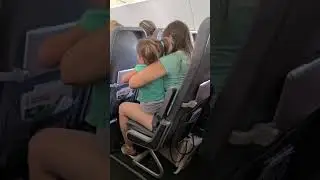 Baby crying on the plane.