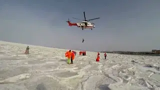 59 tourists rescued after being stranded on floating ice