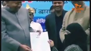 Row erupts after Bihar CM Nitish Kumar is seen touching a Muslim girl's hijab during a public event