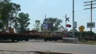 Ferromex with new crossing gates getting down and fast train!!!!!