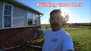 Cutting a hole in the side of a house and building a deck.