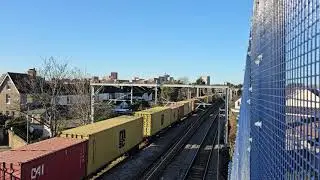 Two Overground trains and a freight train