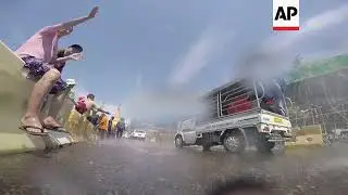 Mass water fights herald arrival of Buddhist New Year in Myanmar