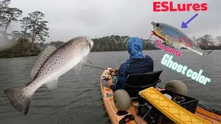 Rainy weather fish biting ! Epic day on kayak fishing in the rain catching lots of speckled trout
