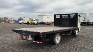 2-12975 2023 Isuzu NPR HD Flatbed Truck 54DC4W1D1PS206069