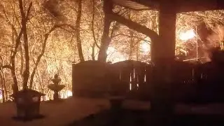 Wind sparks power line fire