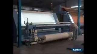 Inspection machine for the quality control of densities, spots, shrinks and defects of the fabric.