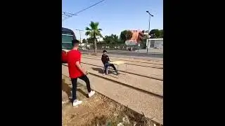 A tram stopped by a boy who  want to drink his coffee ☕️ #shorts #morocco #funny