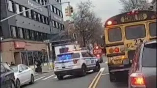 NYPD Officer Passing School Bus While Lights Are Fleshing