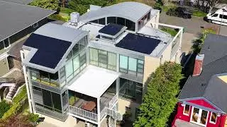 7.7 kw REC Solar Panel Installation on A Curved Metal Roof in Seattle, WA.