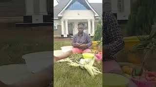 village life Africa, our mum prepares peas for lunch